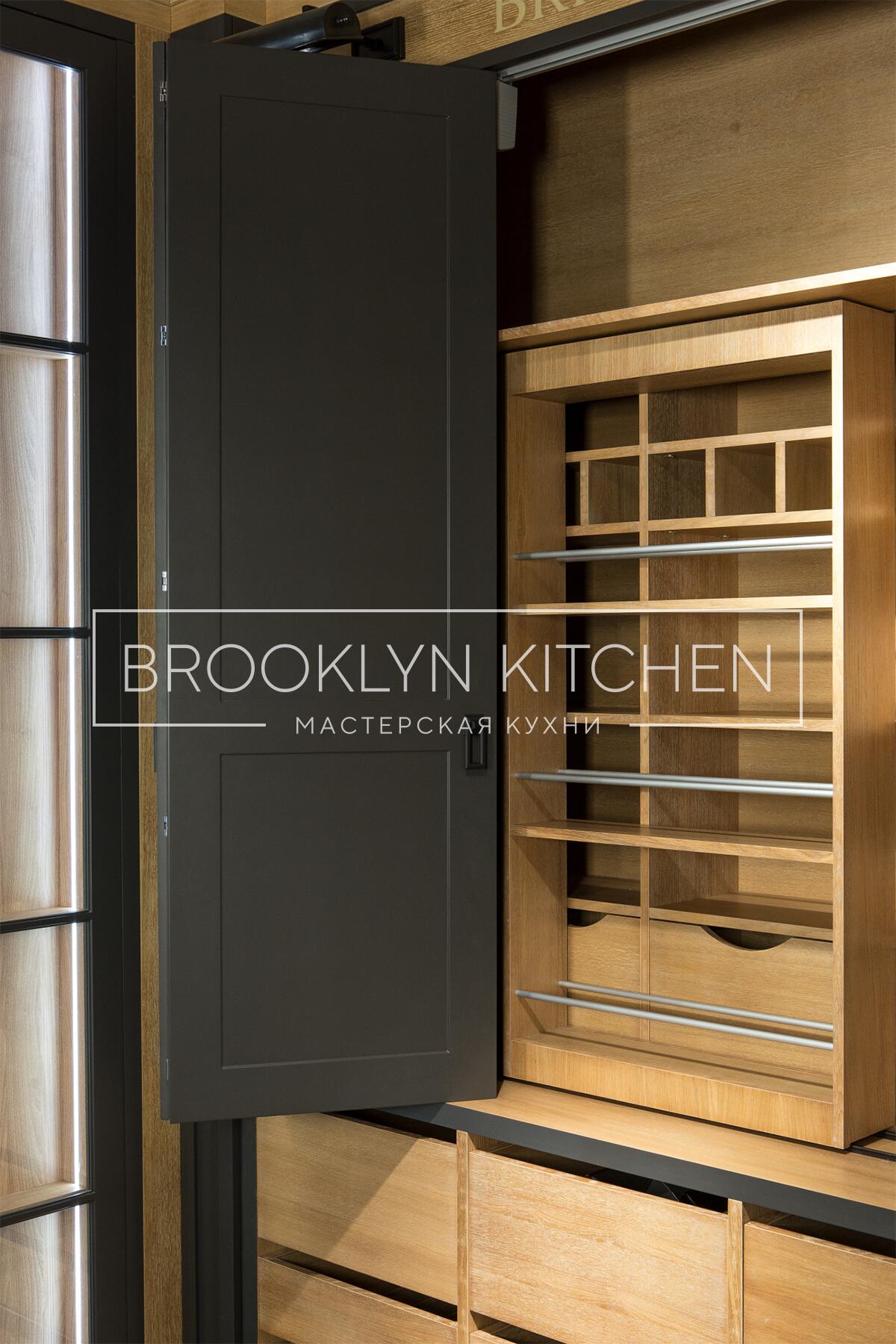 Многофункциональный остров с фасадами под эмалью и подсветкой